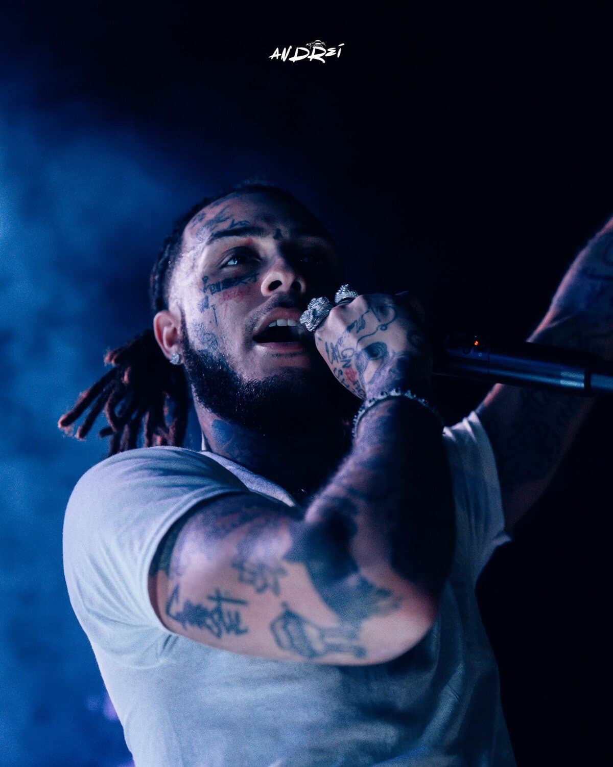 Lil Skies mid-verse under blue light